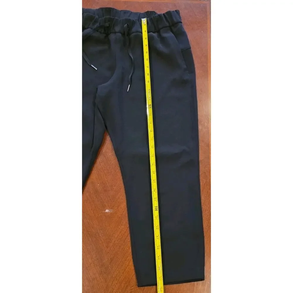 Lululemon On The Fly Black Drawstring Crop Pants Size 8 W6AVMS Athletic Casual